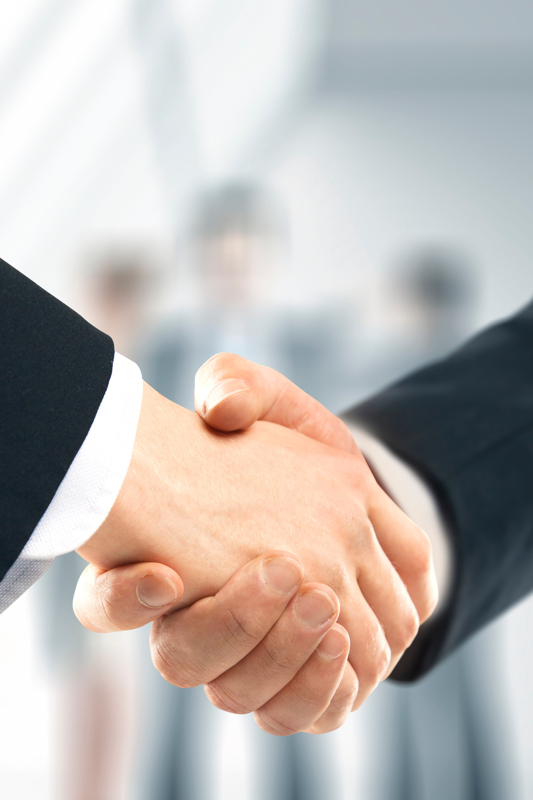 Two business partners shaking hands